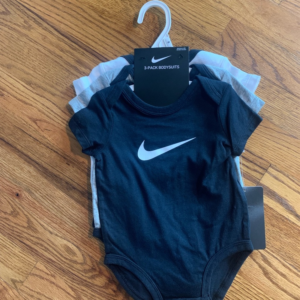 Nike Black Bodysuits with Large Swoosh Logo